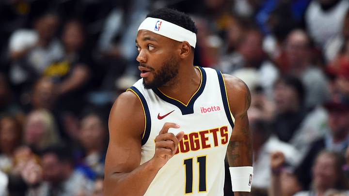 Oct 14, 2025; Denver, Colorado, USA; Denver Nuggets guard Bruce Brown (11) reacts after making a shot during the first half against the Chicago Bulls at Ball Arena. Mandatory Credit: Christopher Hanewinckel-Imagn Images