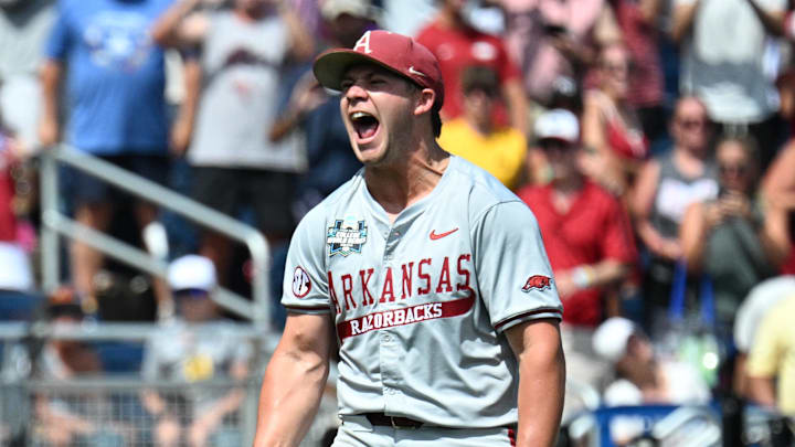 Arkansas Razorbacks starting pitcher Gage Wood celebrates completing a no-hitter at the College World Series.