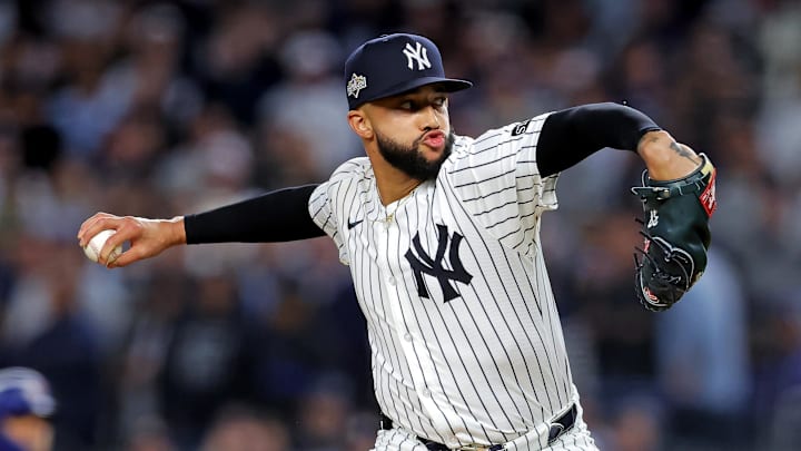 Oct 8, 2025; Bronx, New York, USA; New York Yankees pitcher Devin Williams (38) pitches during the seventh inning against the Toronto Blue Jays during game four of the ALDS round for the 2025 MLB playoffs at Yankee Stadium. Mandatory Credit: Brad Penner-Imagn Images
