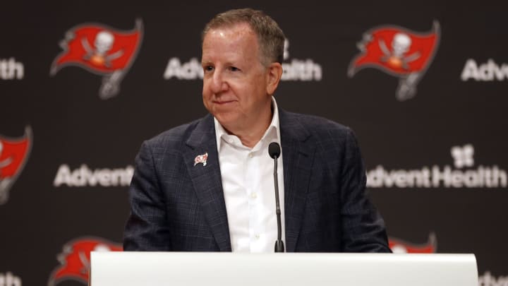 Jul 14, 2021; Tampa, Florida, USA; Tampa Bay Buccaneers owner/co-chairman Bryan Glazer speaks during a press conference to announce that former defensive coordinator Monte Kiffin (not pictured) will be entered into the Tampa Bay Buccaneers-Ring of Honor at AdventHealth Training Center. Mandatory Credit: Kim Klement-USA TODAY Sports Jul 14, 2021; Tampa, Florida, USA; Tampa Bay Buccaneers owner/co-chairman Bryan Glazer speaks during a press conference to announce that former defensive coordinator Monte Kiffin (not pictured) will be entered into the Tampa Bay Buccaneers-Ring of Honor at AdventHealth Training Center. Mandatory Credit: Kim Klement-USA TODAY Sports