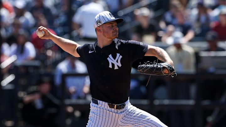 Mar 11, 2025; Tampa, Florida, USA; New York Yankees pitcher Clarke Schmidt (36) throws a pitch against the Baltimore Orioles in the first inning during spring training at George M. Steinbrenner Field. 