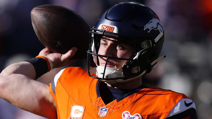 Dec 21, 2025; Denver, Colorado, USA; Denver Broncos quarterback Bo Nix (10) practices before the game at Empower Field at Mile High. Mandatory Credit: Ron Chenoy-Imagn Images
