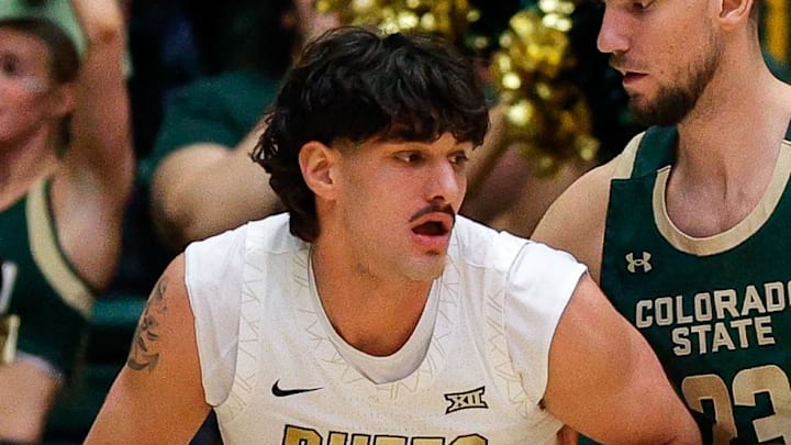 Dec 6, 2025; Fort Collins, Colorado, USA; Colorado Buffaloes forward Alon Michaeli (3) controls the ball as Colorado State Rams forward Nikola Djapa (23) guards in the first half at Moby Arena.