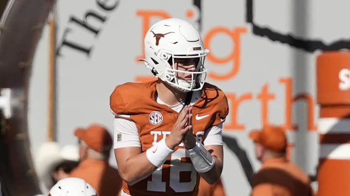 Texas Longhorns quarterback Arch Manning (16) prepares to hike the ball during the second half against the Florida Gators at Darrell K Royal-Texas Memorial Stadium.