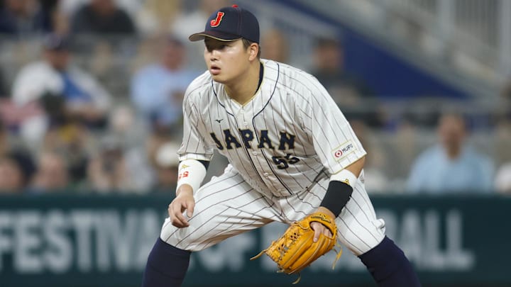 Mar 21, 2023; Miami, Florida, USA; Japan third baseman Munetaka Murakami (55) plays his position during the sixth inning against the USA at LoanDepot Park. 