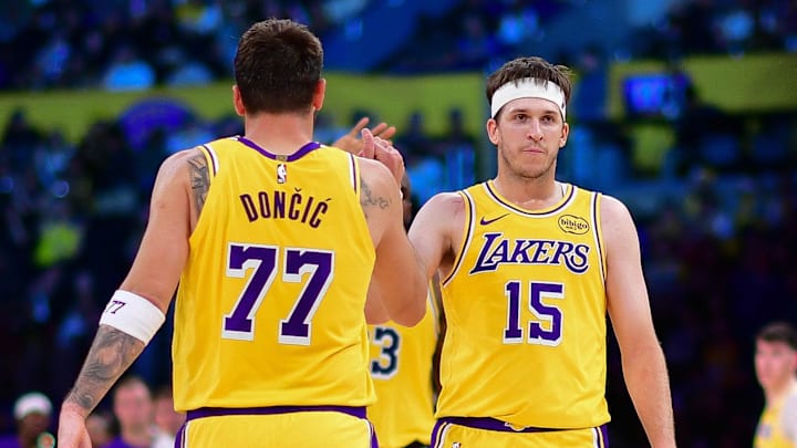 Mar 12, 2026; Los Angeles, California, USA; Los Angeles Lakers guard Luka Doncic (77) and guard Austin Reaves (15) react during the second half at Crypto.com Arena. Mandatory Credit: Gary A. Vasquez-Imagn Images