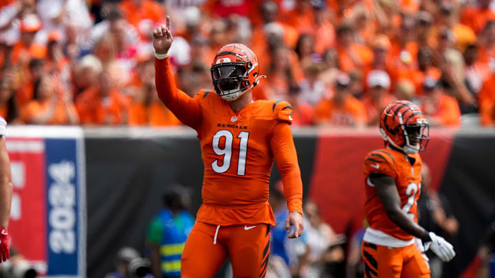 Sep 8, 2024; Cincinnati, Ohio, USA; Cincinnati Bengals defensive end Trey Hendrickson (91) celebrates after a false start penalty on the Patriots in the first quarter of the NFL Week 1 game between the Cincinnati Bengals and the New England Patriots at Paycor Stadium. Mandatory Credit: Sam Greene/USA TODAY Network via Imagn Images Sep 8, 2024; Cincinnati, Ohio, USA; Cincinnati Bengals defensive end Trey Hendrickson (91) celebrates after a false start penalty on the Patriots in the first quarter of the NFL Week 1 game between the Cincinnati Bengals and the New England Patriots at Paycor Stadium. Mandatory Credit: Sam Greene/USA TODAY Network via Imagn Images