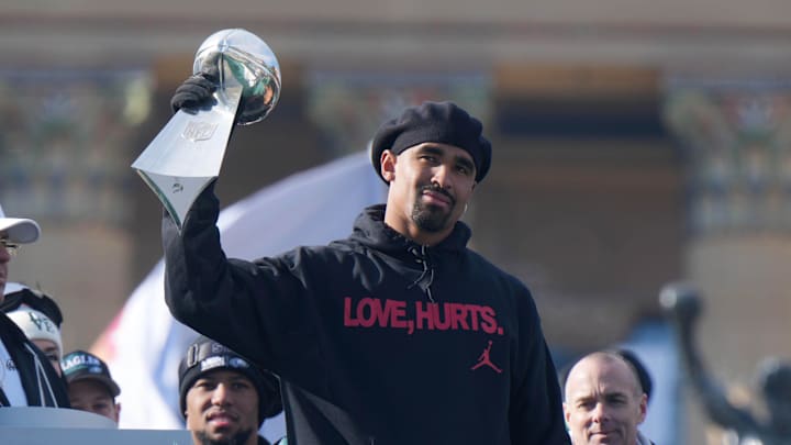 Feb 14, 2025; Philadelphia, PA, USA; Philadelphia Eagles quarterback Jalen Hurts holds the Vince Lombardi Trophy during the Super Bowl LIX championship parade and rally. Mandatory Credit: Kirby Lee-Imagn Images
