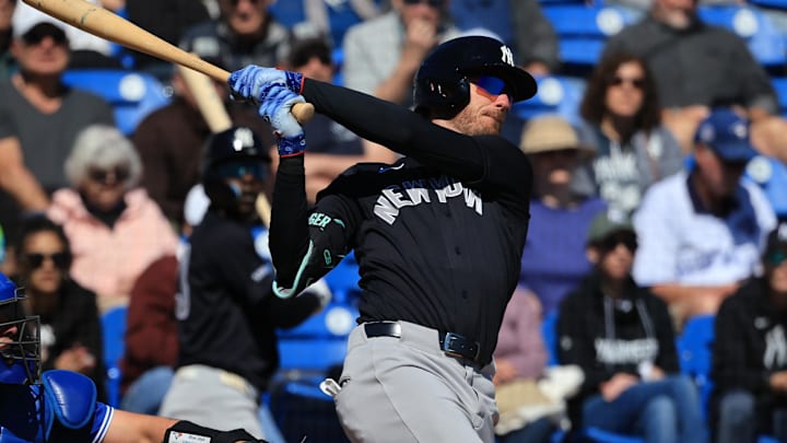 Feb 24, 2026; Dunedin, Florida, USA;  New York Yankees left fielder Cody Bellinger (35) singles during the third inning against the Toronto Blue Jays at TD Ballpark. Mandatory Credit: Kim Klement Neitzel-Imagn Images
