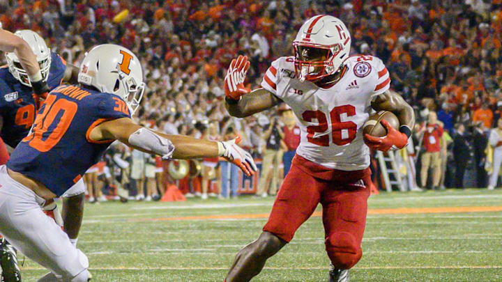 Sep 21, 2019; Champaign, IL, USA; Nebraska Cornhuskers running back Dedrick Mills runs for a touchdown during Nebraska's 900th win as a college football program.