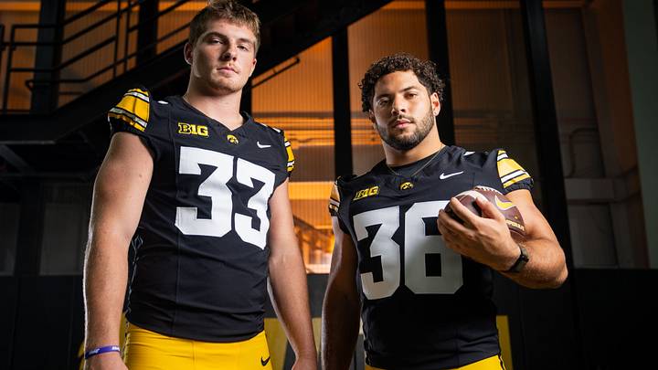 Iowa linebacker Cam Buffington (33) and Iowa linebacker Jayden Montgomery (36) stand for a portrait during Hawkeye football media day, Friday, Aug. 14, 2026, in Iowa City. Iowa linebacker Cam Buffington (33) and Iowa linebacker Jayden Montgomery (36) stand for a portrait during Hawkeye football media day, Friday, Aug. 14, 2026, in Iowa City.