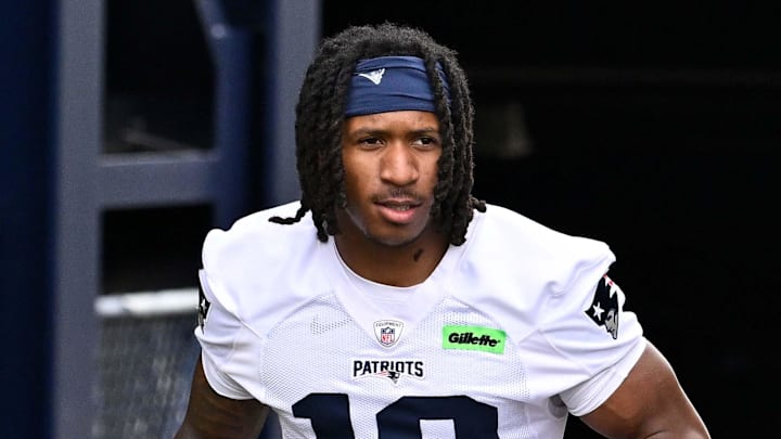 Jun 9, 2025; Foxborough, MA, USA; New England Patriots wide receiver Kyle Williams (18) and New England Patriots wide receiver Jeremiah Webb (29) walk to the practice fields at Gillette Stadium. Mandatory Credit: Eric Canha-Imagn Images