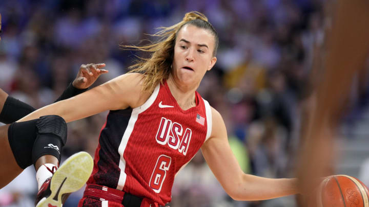 Aug 4, 2024; Villeneuve-d'Ascq, France; Germany point guard Alexis Peterson (1) defends against United States guard Sabrina Ionescu (6) in the first half in a women’s group C game during the Paris 2024 Olympic Summer Games at Stade Pierre-Mauroy. Mandatory Credit: John David Mercer-USA TODAY Sports