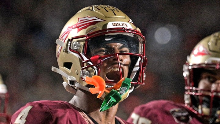 Nov 11, 2023; Tallahassee, Florida, USA; Florida State Seminoles wide receiver Keon Coleman (4) celebrates a touchdown score against the Miami Hurricanes during the second half at Doak S. Campbell Stadium. Mandatory Credit: Melina Myers-Imagn Images