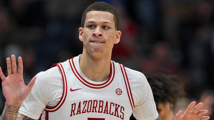 Mar 15, 2026; Nashville, TN, USA; Arkansas Razorbacks forward Trevon Brazile (7) reacts after a made three point basket against the Vanderbilt Commodores during the second half during the men's SEC Conference Tournament Championship at Bridgestone Arena. Mandatory Credit: Steve Roberts-Imagn Images