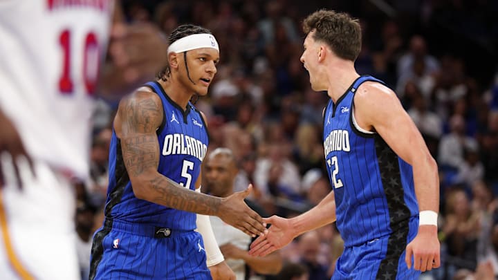 Feb 27, 2025; Orlando, Florida, USA; Orlando Magic forward Paolo Banchero (5) and forward Franz Wagner (22) celebrate after a basket against the Golden State Warriors in the second quarter at Kia Center. Mandatory Credit: Nathan Ray Seebeck-Imagn Images