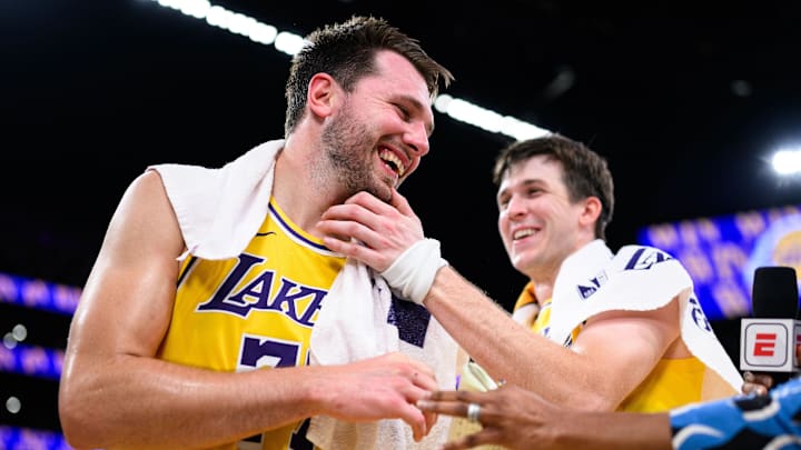 Mar 14, 2026; Los Angeles, California, USA; Los Angeles Lakers guard Luka Doncic (77) reacts with guard Austin Reaves (15) after scoring a game-winning shot during overtime against the Denver Nuggets at Crypto.com Arena. Mandatory Credit: William Liang-Imagn Images Mar 14, 2026; Los Angeles, California, USA; Los Angeles Lakers guard Luka Doncic (77) reacts with guard Austin Reaves (15) after scoring a game-winning shot during overtime against the Denver Nuggets at Crypto.com Arena. Mandatory Credit: William Liang-Imagn Images