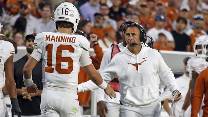 Texas Longhorns head coach Steve Sarkisian reacts with Texas Longhorns quarterback Arch Manning (16) during the fourth quarter against the Mississippi State Bulldogs. Texas Longhorns head coach Steve Sarkisian reacts with Texas Longhorns quarterback Arch Manning (16) during the fourth quarter against the Mississippi State Bulldogs.