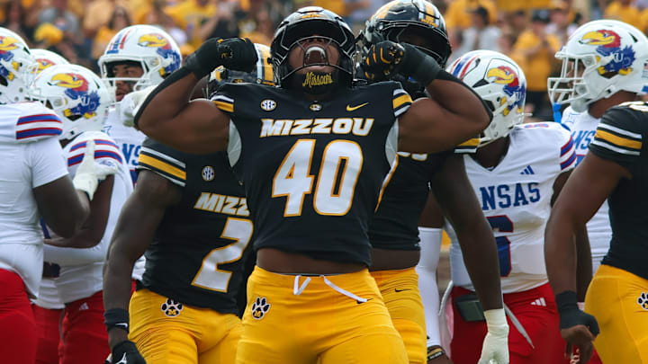 Sep 6, 2025; Columbia, Missouri, USA; Missouri Tigers linebacker Josiah Trotter (40) celebrates a tackle in the first quarter of the Border War against the Kansas Jayhawks at Faurot Field at Memorial Stadium