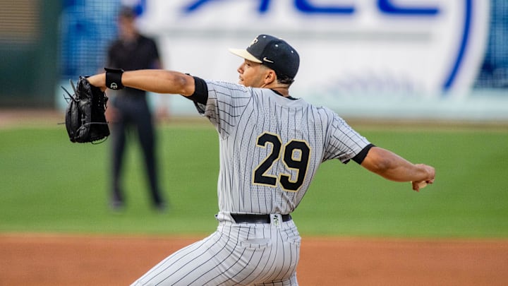 May 24, 2024; Charlotte, NC, USA; Wake Forest pitcher Chase Burns (29) comes out for the second inning against the North Carolina Tar Heels during the ACC Baseball Tournament at Truist Field. Mandatory Credit: Scott Kinser-Imagn Images