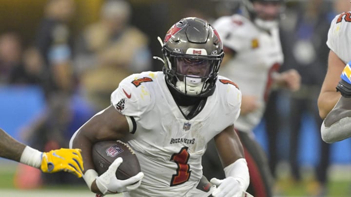 Tampa Bay Buccaneers running back Rachaad White carries the ball for a 7-yard gain in the second half against the Los Angeles Chargers.