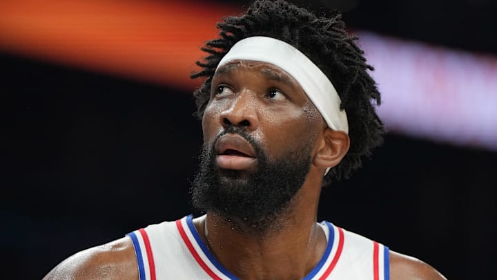 Feb 7, 2026; Phoenix, Arizona, USA; Philadelphia 76ers center Joel Embiid (21) reacts against the Phoenix Suns during the first half of an NBA game at Mortgage Matchup Center. Mandatory Credit: Rick Scuteri-Imagn Images