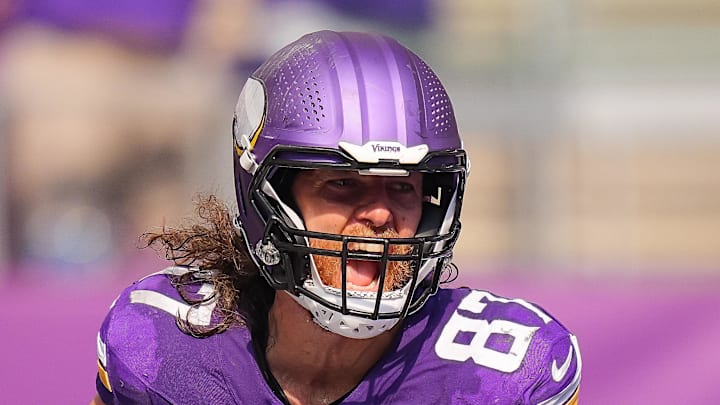 Sep 21, 2025; Minneapolis, Minnesota, USA; Minnesota Vikings tight end TJ. Hockenson (87) catches a touchdown pass against the Cincinnati Bengals during the second half at U.S. Bank Stadium. Mandatory Credit: Brad Rempel-Imagn Images