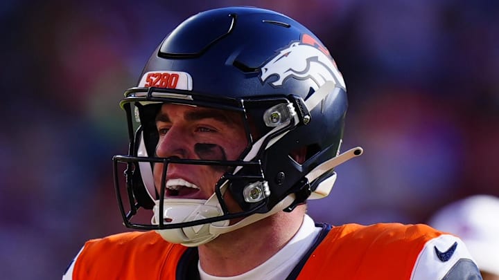 Jan 17, 2026; Denver, CO, USA; Denver Broncos quarterback Bo Nix (10) calls an audible during the first quarter of an AFC Divisional Round playoff game against the Buffalo Bills at Empower Field at Mile High. Mandatory Credit: Ron Chenoy-Imagn Images