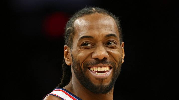 Kawhi Leonard smiles against the Phoenix Suns in the second half at Mortgage Matchup Center. Kawhi Leonard smiles against the Phoenix Suns in the second half at Mortgage Matchup Center.