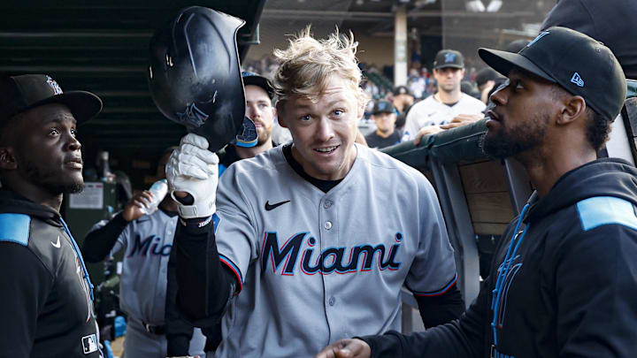 May 14, 2025; Chicago, Illinois, USA; Miami Marlins center fielder Kyle Stowers (28) celebrates with teammates in the dugout after hitting a solo home run against the Chicago Cubs during the second inning at Wrigley Field. Mandatory Credit: Kamil Krzaczynski-Imagn Images