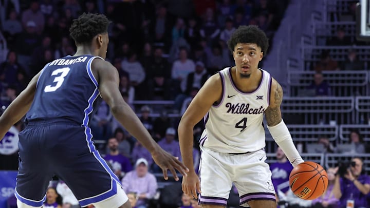Kansas State guard P.J. Haggerty brings the ball up court against Brigham Young forward AJ Dybantsa during the second half.