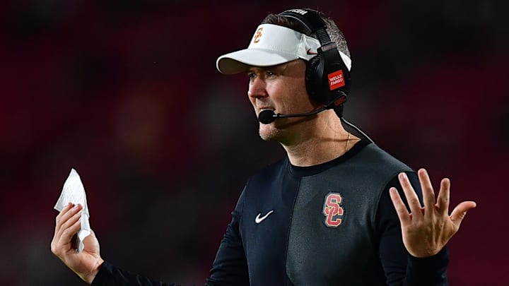 Sep 20, 2025; Los Angeles, California, USA; Southern California Trojans head coach Lincoln Riley watches game action against the Michigan State Spartans during the second half at the Los Angeles Memorial Coliseum. Mandatory Credit: Gary A. Vasquez-Imagn Images