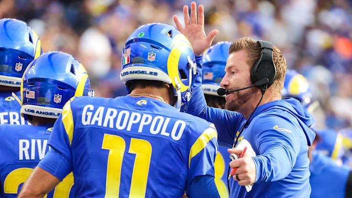 Jan 5, 2025; Inglewood, California, USA;  Los Angeles Rams Head Coach Sean McVay congratulates Quarterback Jimmy Garoppolo (11) after a touchdown drive at SoFi Stadium. Mandatory Credit: William Navarro-Imagn Images