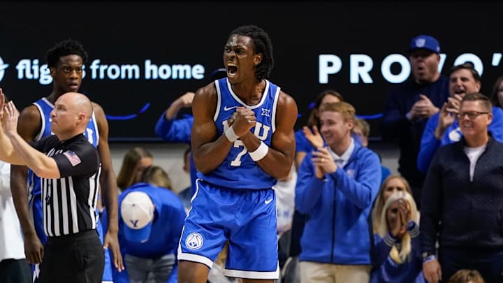 Jan 24, 2026; Provo, Utah, USA; BYU Cougars forward Khadim Mboup (7) reacts during the first half against the Utah Utes at Marriott Center. Mandatory Credit: Aaron Baker-Imagn Images