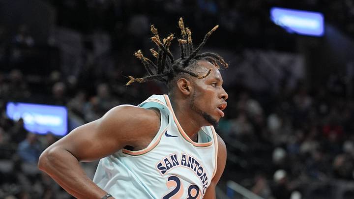 Dec 8, 2024; San Antonio, Texas, USA;  San Antonio Spurs center Charles Bassey (28) rebounds in the first half against the New Orleans Pelicans at Frost Bank Center. Mandatory Credit: Daniel Dunn-Imagn Images