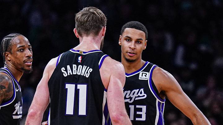 Jan 10, 2025; Boston, Massachusetts, USA; Sacramento Kings forward DeMar DeRozan (10), forward Keegan Murray (13) and forward Domantas Sabonis (11) react after defeating the Boston Celtics at TD Garden. Jan 10, 2025; Boston, Massachusetts, USA; Sacramento Kings forward DeMar DeRozan (10), forward Keegan Murray (13) and forward Domantas Sabonis (11) react after defeating the Boston Celtics at TD Garden.