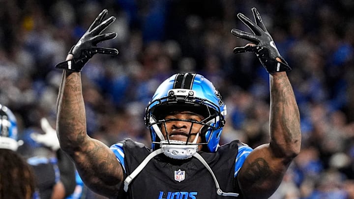 Detroit Lions cornerback D.J. Reed (4) celebrates 34-27 win over New York Giants in overtime at Ford Field in Detroit on Sunday, Nov. 23, 2025.