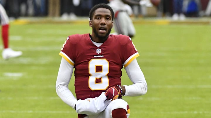 Dec 9, 2018; Landover, MD, USA; Washington Redskins quarterback Josh Johnson (8) warms before the game between the Washington Redskins and the New York Giants at FedEx Field. Mandatory Credit: Brad Mills-Imagn Images