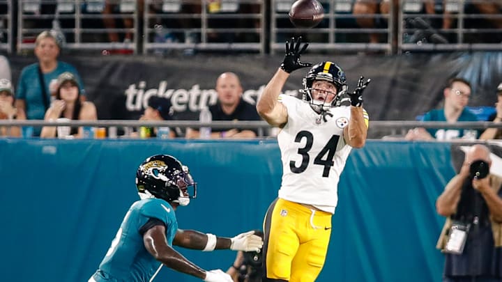 Aug 9, 2025; Jacksonville, Florida, USA; Pittsburgh Steelers running back Max Hurleman (34) catches a deep pass against the Jacksonville Jaguars during a preseason game at EverBank Stadium. Mandatory Credit: Travis Register-Imagn Images Aug 9, 2025; Jacksonville, Florida, USA; Pittsburgh Steelers running back Max Hurleman (34) catches a deep pass against the Jacksonville Jaguars during a preseason game at EverBank Stadium. Mandatory Credit: Travis Register-Imagn Images