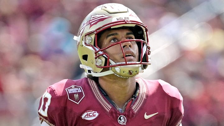 Oct 14, 2023; Tallahassee, Florida, USA; Florida State Seminoles quarterback Jordan Travis (13) against the Syracuse Orange during the first half at Doak S. Campbell Stadium. Mandatory Credit: Melina Myers-Imagn Images Oct 14, 2023; Tallahassee, Florida, USA; Florida State Seminoles quarterback Jordan Travis (13) against the Syracuse Orange during the first half at Doak S. Campbell Stadium. Mandatory Credit: Melina Myers-Imagn Images