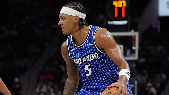 Oct 30, 2025; Charlotte, North Carolina, USA; Orlando Magic forward Paolo Banchero (5) handles the ball against the Charlotte Hornets during the first quarter at Spectrum Center. Mandatory Credit: Jim Dedmon-Imagn Images Oct 30, 2025; Charlotte, North Carolina, USA; Orlando Magic forward Paolo Banchero (5) handles the ball against the Charlotte Hornets during the first quarter at Spectrum Center. Mandatory Credit: Jim Dedmon-Imagn Images