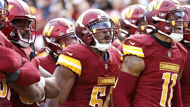 Nov 24, 2024; Landover, Maryland, USA; Washington Commanders linebacker Bobby Wagner (54) celebrates with teammates after a turnover against the Dallas Cowboys at Northwest Stadium. Mandatory Credit: Geoff Burke-Imagn Images