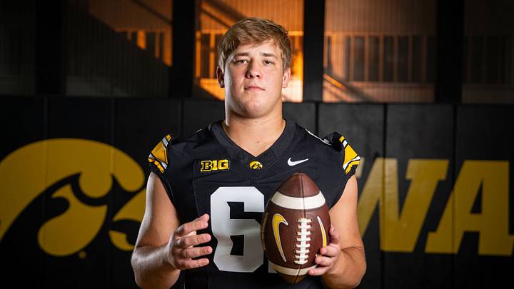 Iowa offensive lineman Cael Winter (61) stands for a portrait during Hawkeye football media day, Friday, Aug. 14, 2026, in Iowa City. Iowa offensive lineman Cael Winter (61) stands for a portrait during Hawkeye football media day, Friday, Aug. 14, 2026, in Iowa City.