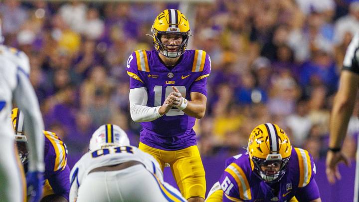 Oct 3, 2026; Baton Rouge, Louisiana, USA; LSU Tigers quarterback Sam Leavitt (10) calls for the ball against McNeese Cowboys safety Cohen Charles (7) during the first half at Tiger Stadium. Mandatory Credit: Stephen Lew-Imagn Images Oct 3, 2026; Baton Rouge, Louisiana, USA; LSU Tigers quarterback Sam Leavitt (10) calls for the ball against McNeese Cowboys safety Cohen Charles (7) during the first half at Tiger Stadium. Mandatory Credit: Stephen Lew-Imagn Images