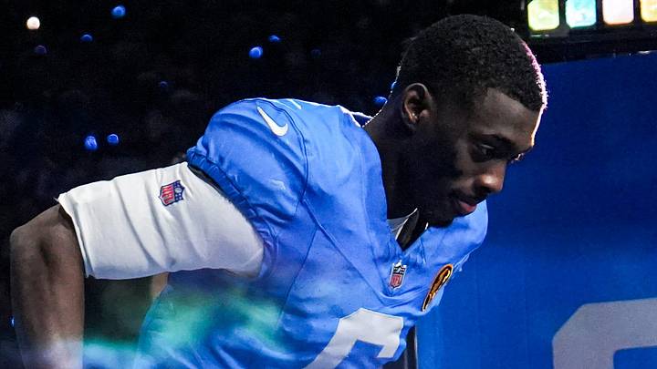 Detroit Lions cornerback Terrion Arnold runs onto the field during player introductions before the Thanksgiving game against Green Bay Packers at Ford Field in Detroit on Thursday, Nov. 27, 2025.