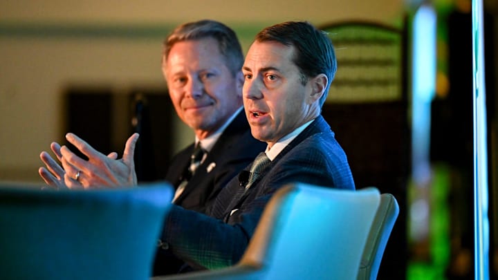 Michigan State University Athletic Director J Batt, right, speaks on stage with MSU President Kevin Guskiewicz during a panel discussion hosted by the Lansing Economic Club on Thursday, Sept. 11, 2025, at the Kellogg Center in East Lansing.