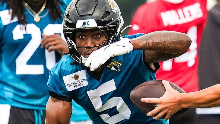 Jacksonville Jaguars wide receiver LeQuint Allen Jr. (5) akes a hand off from Jacksonville Jaguars quarterback Joey Aguilar (17) during the second day of minicamp at the Miller Electric Center, Wednesday, June 10, 2026, in Jacksonville. 