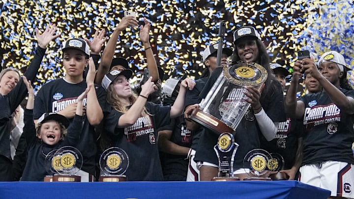 South Carolina basketball alum Laeticia Amihere with the SEC Championship trophy