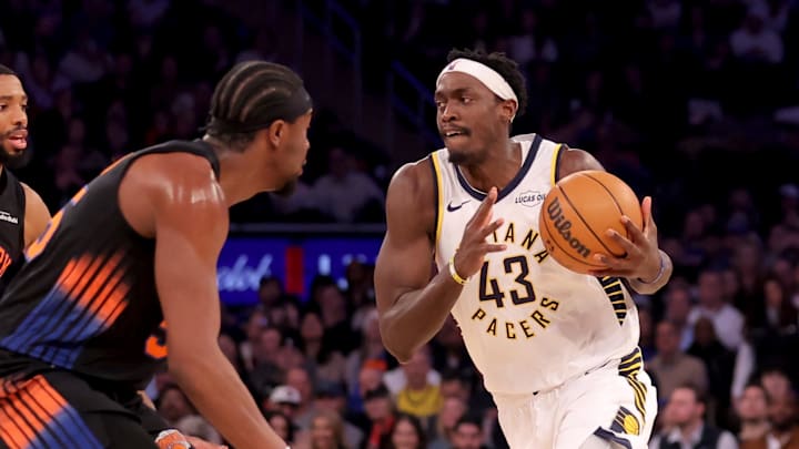 Feb 10, 2026; New York, New York, USA; Indiana Pacers forward Pascal Siakam (43) controls the ball against New York Knicks guard Mikal Bridges (25) and center Ariel Hukporti (55) during the first quarter at Madison Square Garden. Mandatory Credit: Brad Penner-Imagn Images