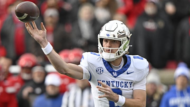 Nov 29, 2025; Louisville, Kentucky, USA;  Kentucky Wildcats quarterback Cutter Boley (8) passes the ball against the Louisville Cardinals during the first quarter at L&N Federal Credit Union Stadium. Mandatory Credit: Jamie Rhodes-Imagn Images